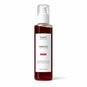 Saach Hibiscus Infused Hair Oil bottle with hibiscus flowers and natural ingredients visible in the image.