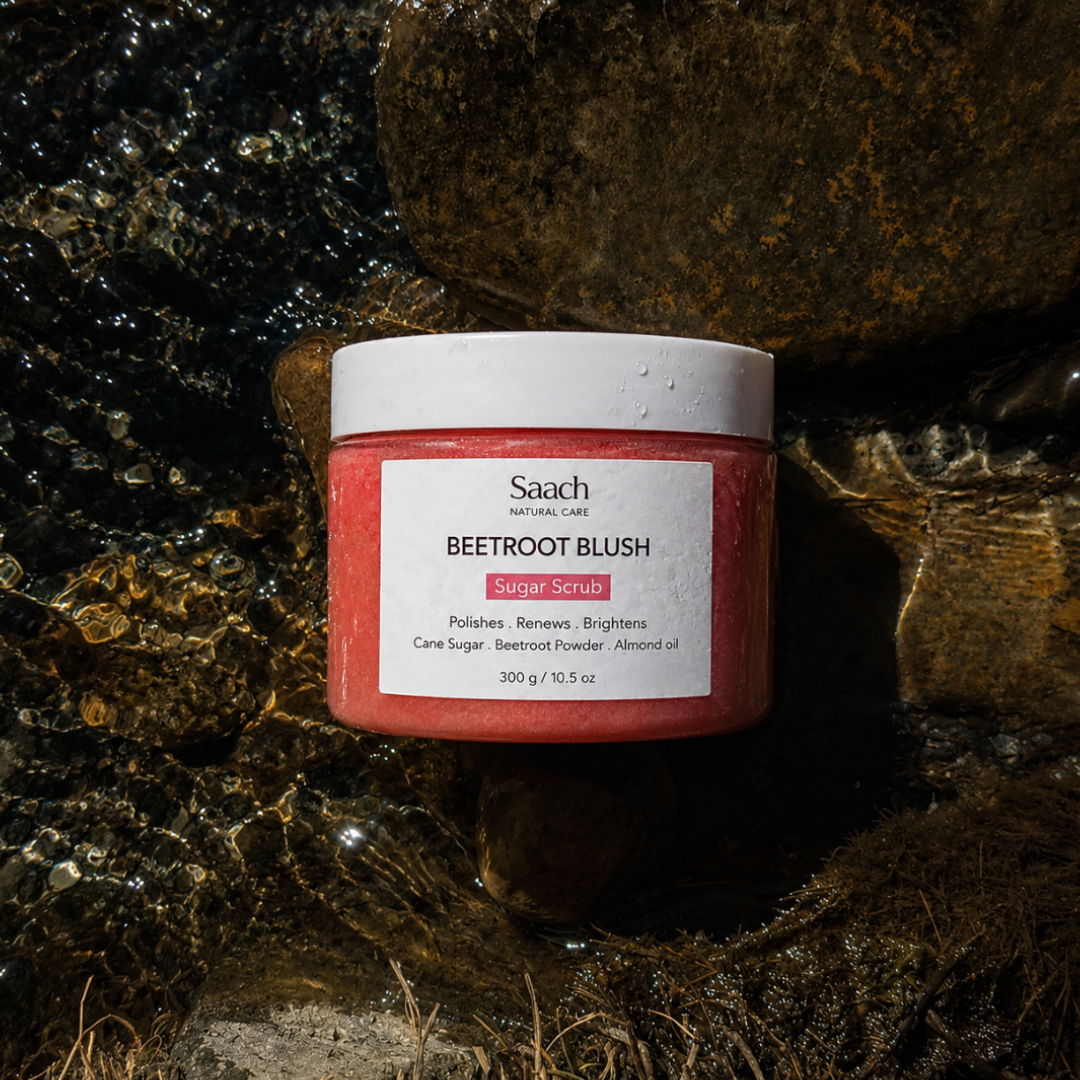 Saach Sugar Body Scrub in a jar, showing textured sugar exfoliant with a natural, creamy appearance for smooth skin.