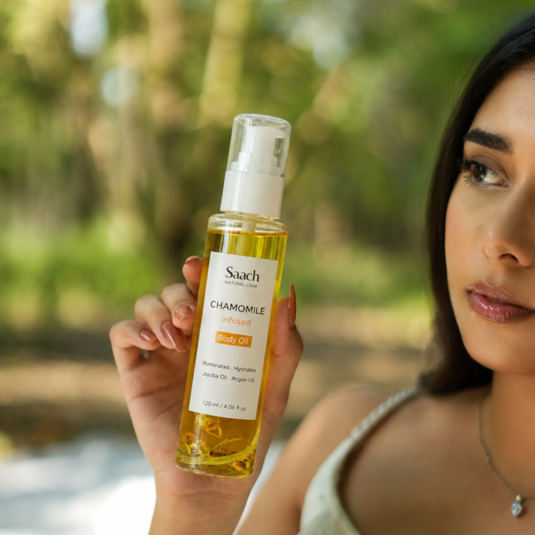 Saach Chamomile Infused Body Oil bottle with golden oil, featuring chamomile flowers and a natural, soothing appearance