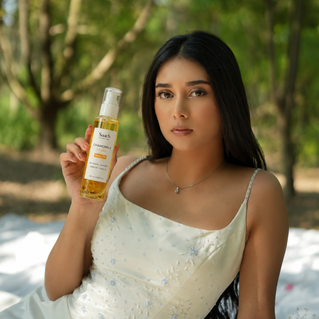 Saach Chamomile Infused Body Oil bottle with a natural, golden liquid, showcasing the herbal infusion and calming packaging.